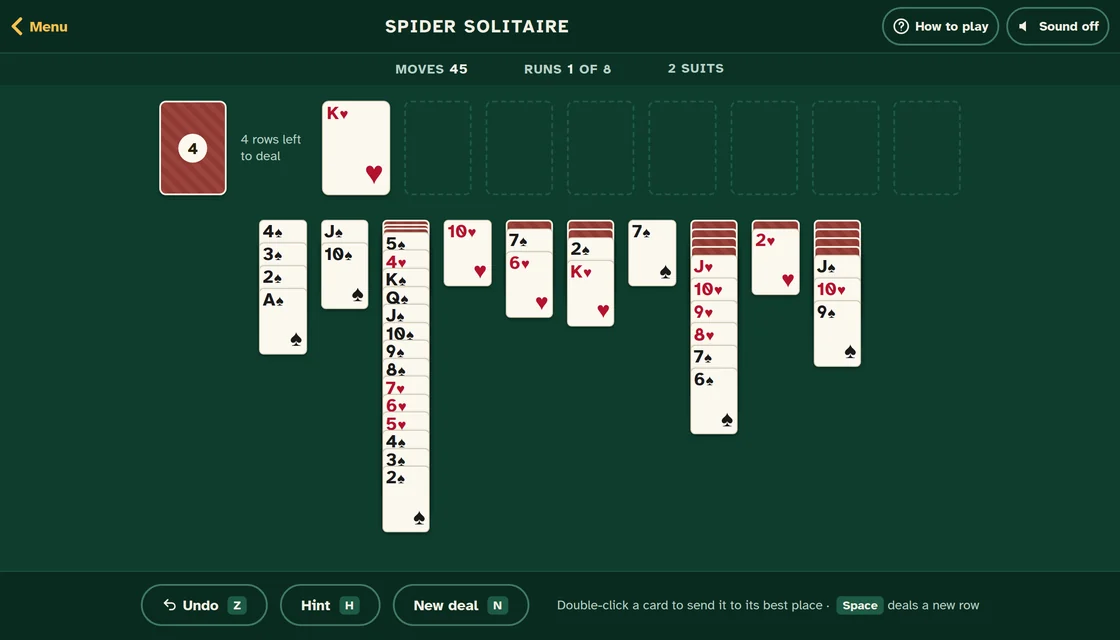 Actual Spider Solitaire gameplay with two suits: the stock with four rows left to deal, one finished run of hearts at the top, and the ten piles below, one with a long run from the king down to the 2 in spades and hearts.